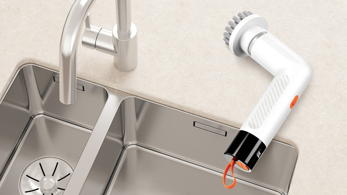 Szczotka akumulatorowa EXTRALINK Powerlink EX.95382, Głowica, obrót, narożniki, precyzja, Szczotka akumulatorowa leżąca przy zlewie kuchennym.