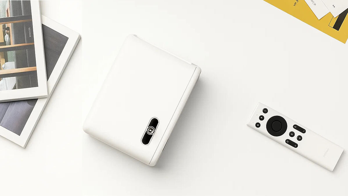 Projektor WANBO Mini Pro WPE01 HDMI USB AV Bluetooth głośnik membranowy, projektor z gory stojący na stole z pilotem