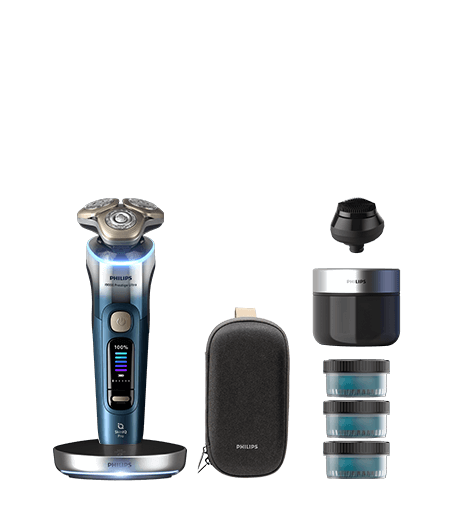 Golarka z akcesoriami - etui, trymerem do brody, podstawką ładującą, stacją czyszczącą i wkładem. Golarka z akcesoriami - etui, trymerem do brody, stacją czyszczącą i wkładem. Golarka leżąca w otwartym etui. Golarka z głowicą umieszczoną w stacji czyszczącej. Golarka umieszczona w stacji ładującej. Okrągły przezroczysty pojemnik z czarną nakrętk z niebieskim płynem w  środku.