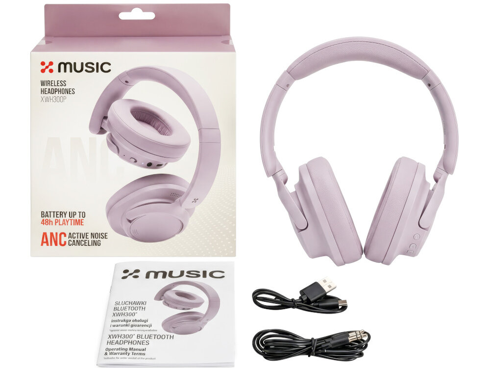 Na obrazie widoczne są różowe słuchawki nauszne oraz ich opakowanie z napisem \'MUSIC Wireless Headphones XWH300P\'. Obok znajdują się dwa kable oraz instrukcja obsługi z logo \'MUSIC\'.