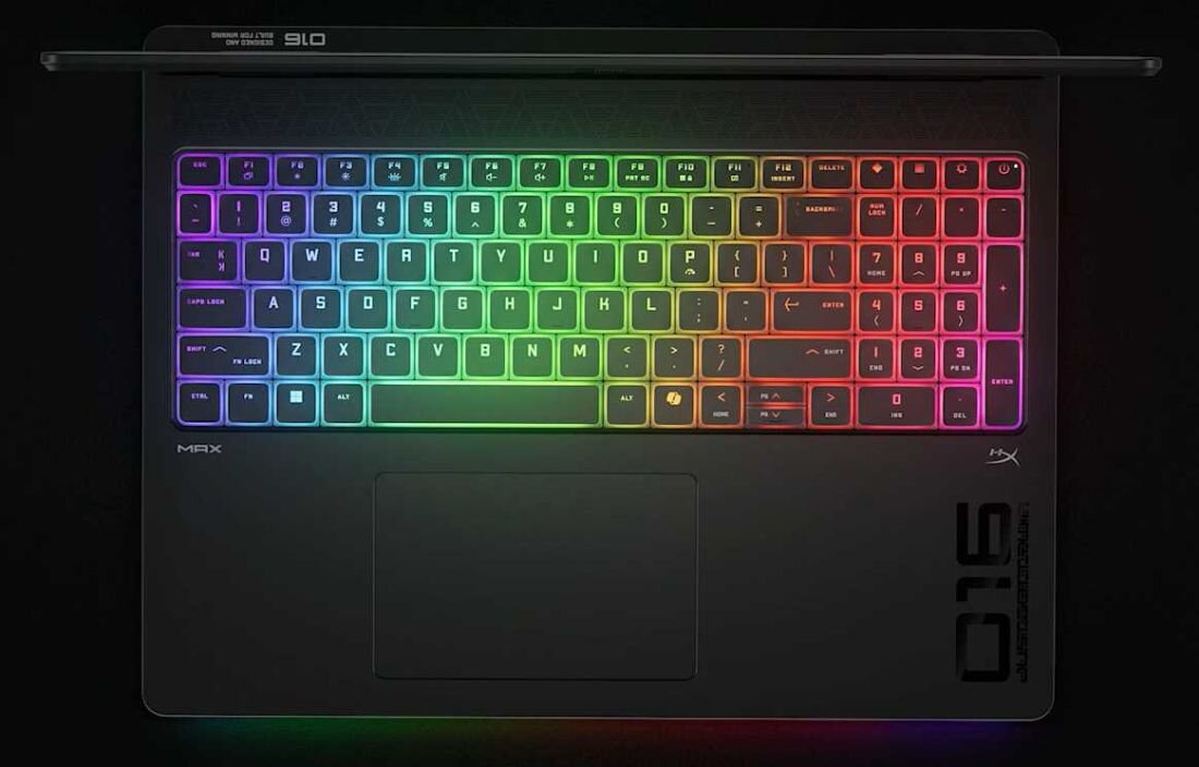 Laptop z kolorową klawiaturą RGB, świecącą w odcieniach tęczy.  - pasek świetlny i klawiatura RGB 