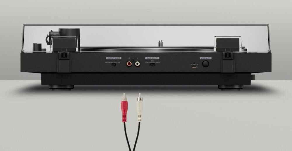 Gramofon SONY PS-LX5BT regulacja poziomu wyjścia dopasowanie do wzmacniacza, gramofon od tyłu na szarym tle, złącza