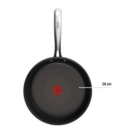 Czarna patelnia z metalowym uchwytem, na środku widoczny czerwony okrąg z logo Tefal.