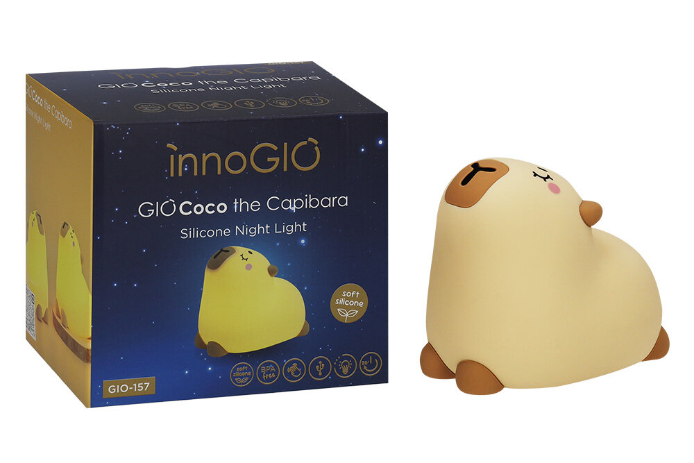 Lampka nocna INNOGIO Giococo the Capybara GIO-157 Silikonowa lampka nocna w kształcie beżowej kapibary obok swojego oryginalnego, granatowego opakowania z napisem innoGIO GIOcoco the Capibara.