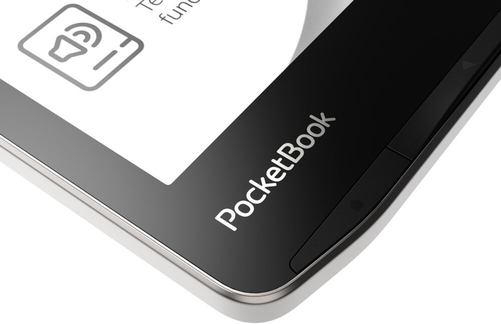 Zbliżenie na czytnik e-booków z widocznym logo \'PocketBook\' na czarnej ramce. Na ekranie widoczna jest ikona głośnika i fragment tekstu: \'Te... funkc...\'.