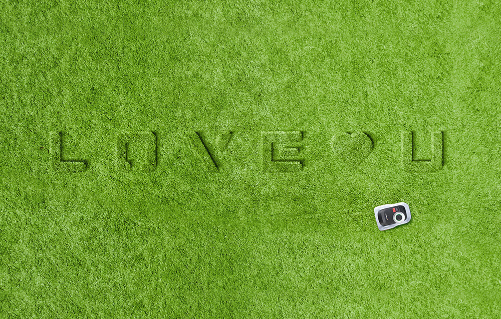 Robot koszący SEGWAY NAVIMOW i220E ogród trawnik widok z góry napis na trawie love u robot samodzielnie skanuje teren tworzy dokładną mapę ogrodu funkcja GeoSketch™ 20 stref koszenia system „przeciągnij i upuść” szybkie wprowadzanie zmian kreatywne wzory koszenia system Creative Doodle Tool