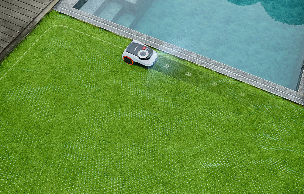 Robot koszący SEGWAY NAVIMOW i220E ogród trawnik robot kosi trawę wzdłuż basenu szerokość koszenia 22 cm technologia EdgeSense™ dokładne koszenie aż do samej granicy trawnika na nachyleniach do 45% (24°) system ESC od 2 do 7 cm sześć ostrzy tnących