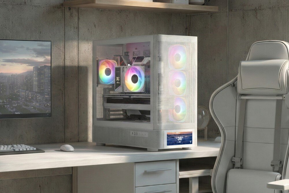 Obudowa MODECOM Volcano AQ 500 ARGB Midi obudowa komputerowa z przeszklonym bokiem stojąca na biurku obok monitora i klawiatury