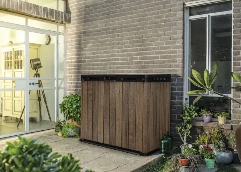 Szafa ogrodowa KETER Store It Out Darwin 1150L Brązowy zdjęcie lifestyle Odporność na pogodę odporność na deszcz, śnieg oraz promieniowanie UV wymiary waga