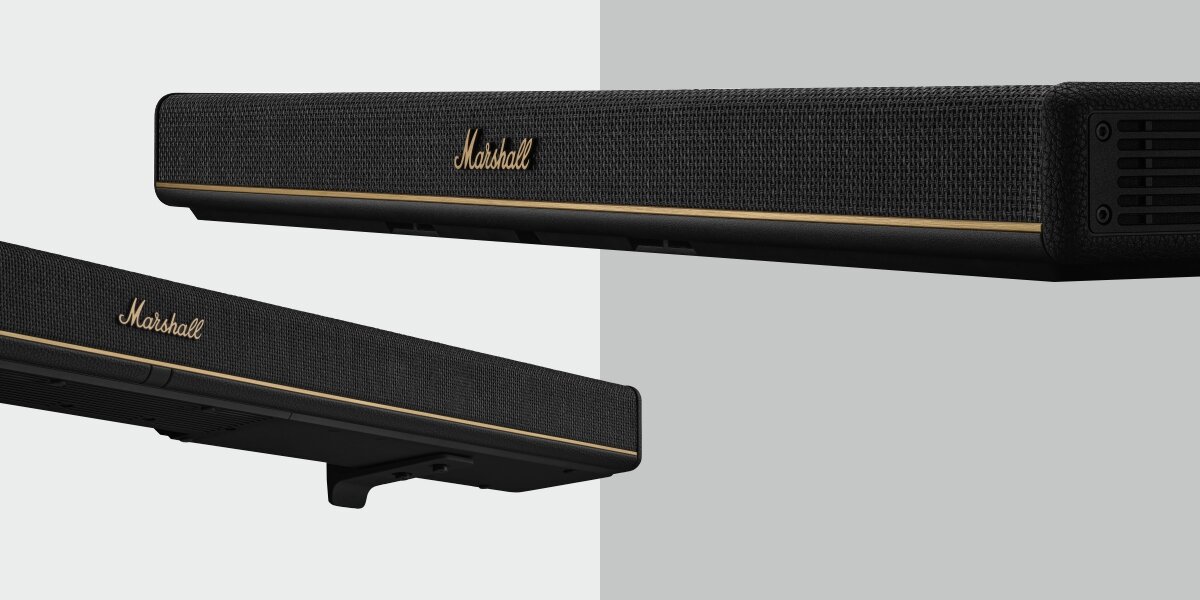 Soundbar MARSHALL Heston 60 tryb muzyczny filmowy nocny głosowy regulacja brzmienia, soundbar po skosie na szaro-białym tle