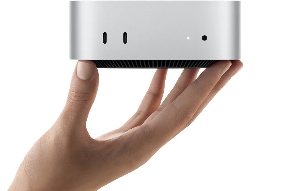 Komputer APPLE Mac Mini 2024 M4 16GB RAM 256GB SSD macOS dłoń trzymająca komputer Mac Mini wielkość wymiary