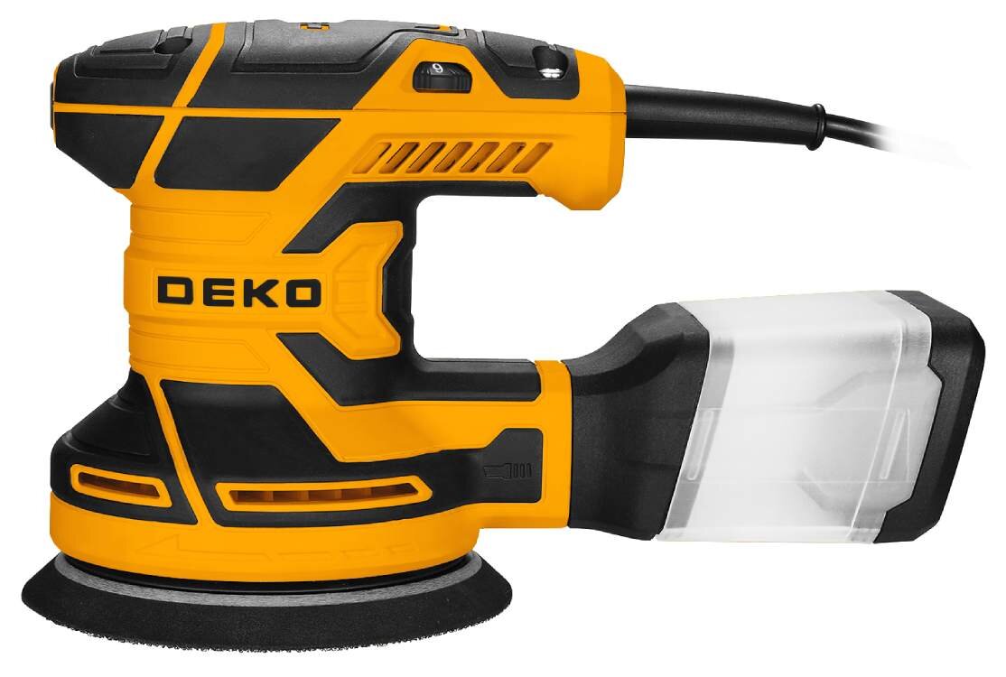 Na obrazie widoczna jest szlifierka mimośrodowa w kolorze żółto-czarnym z napisem \'DEKO\'. Urządzenie posiada przezroczysty pojemnik na pył i kabel zasilający.
