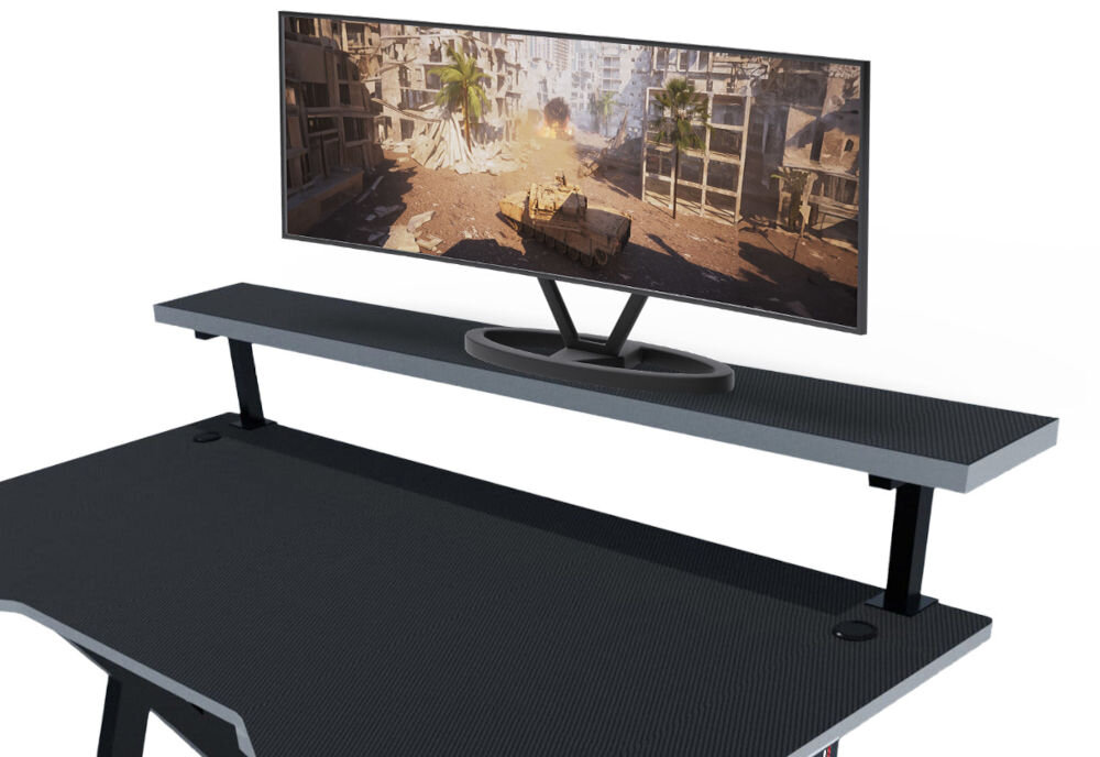 Biurko gamingowe COBRA CR4009BK Czarny z myślą o funkcjonalności produkt został wyposażony w dodatkową półkę na blacie biurko na białym tle z widoczną półką, na której stoi monitor