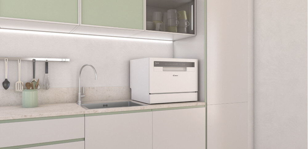 Zmywarka CANDY CP 6E51LW program eco mycie ekologiczne mniejsze zużycie wody oszczędności 6 kompletów naczyń pojemność zmywarki wnętrze program szybki 35 minut mycie suszenie oszczędności do małych kuchni oszczędność miejsca kompaktowe urządzenie wymiary 44,3 cm x 55 cm x 50 cm