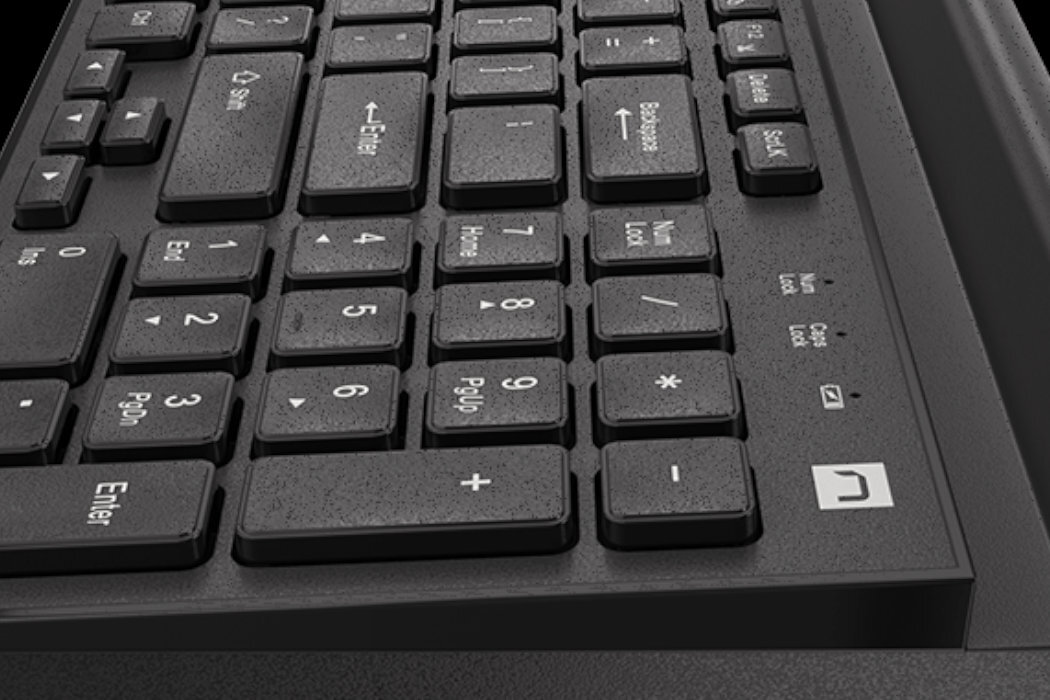 Czarna klawiatura z widocznymi klawiszami numerycznymi i funkcyjnymi, w tym \'Enter\', \'Num Lock\', \'Page Up\', \'Page Down\'. Na obudowie znajduje się logo w kształcie litery \'N\'.