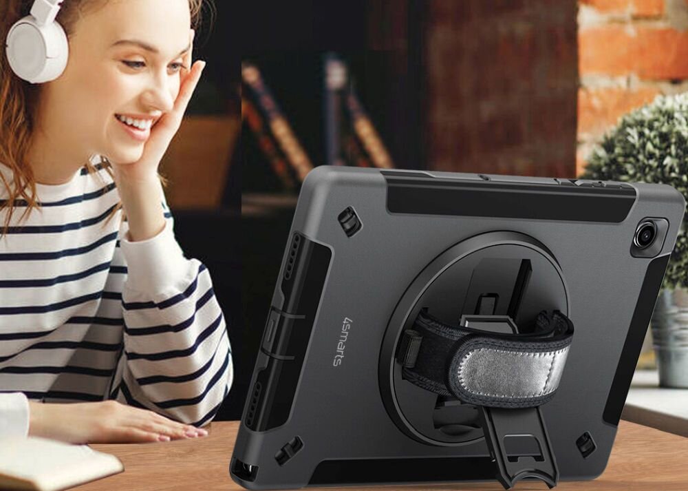 Etui na iPad 4SMARTS Rugged Case Grip Czarny Apple iPad 11 i 10,9 kobieta siedząca w słuchawkach przy biurku z tabletem w etui