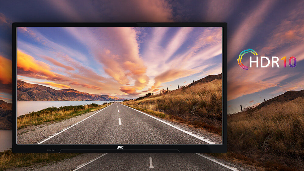 Telewizor JVC LT-24VAHM330 - Rozdzielczość HD i HDR10, telewzior na tle krajobrazu