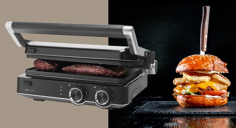 Grill elektryczny ETA GrillChef ETA515690000 zamknięty grill przodem obok hamburger, bez nadmiaru tłuszczu