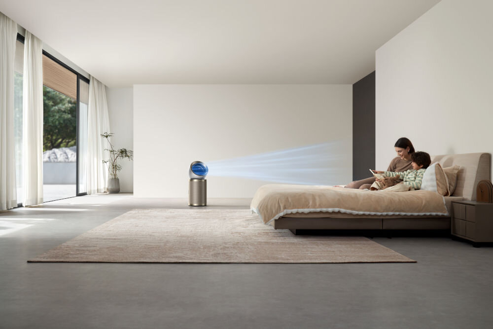 Oczyszczacz powietrza DREAME AirPursue PM10 osoba relaksująca się na łóżku pomiesczenia do 100 metrów duże pomieszczenia zasięg do 10 metrów daleki zasięg