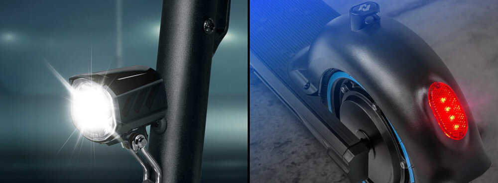 Hulajnoga elektryczna NEOLINE T26 Czarny przedni reflektor soczewkowy LED moc 2,4 W regulacja kata swiecenie do okolo 10 metrow widocznosci tylna lampa LED jasne swiatlo hamowania odblaski na calej konstrukcji