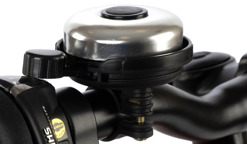 Rower młodzieżowy KARBON Superlight 24 cale dla chłopca Miedziany białe tło zbliżenie na dzwonek praktyczny dzwonek sygnalizowanie obecności element zwiększający bezpieczeństwo