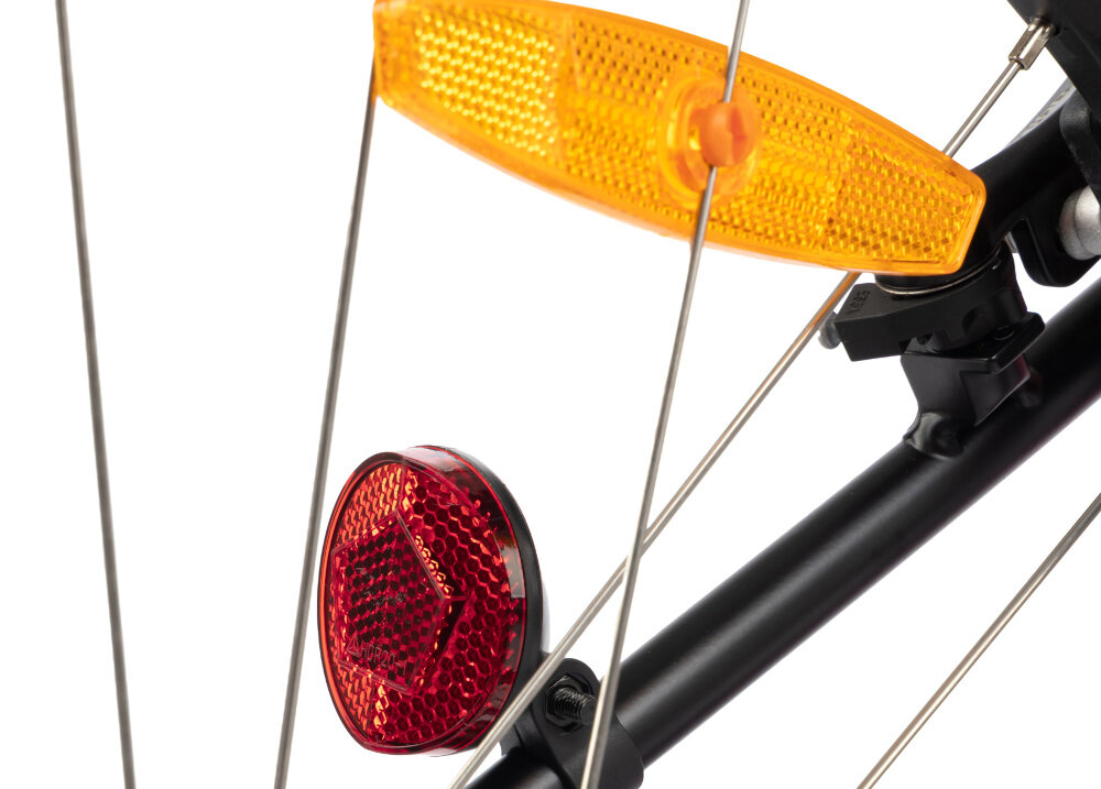 Rower młodzieżowy KARBON Superlight 26 cale dla dziewczynki Różowy białe tło zbliżenie na odblaski umieszczone na kole pakiet odblasków umieszczonych w kluczowych miejscach konstrukcji rowerek staje się lepiej widoczny po zmroku i w pochmurne dni wsparcie bezpieczeństwa odblaski zwiększają dostrzegalność dziecka