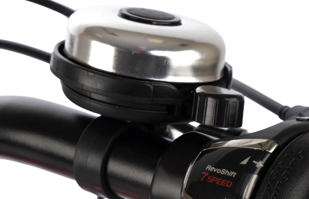 Rower młodzieżowy KARBON Superlight 26 cale dla chłopca Czerwony białe tło zbliżenie na dzwonek praktyczny dzwonek sygnalizowanie obecności element zwiększający bezpieczeństwo