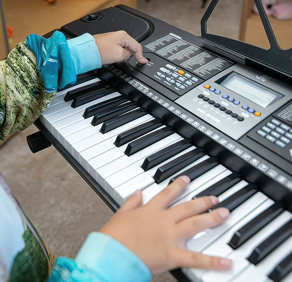 Keyboard MK 2106 dla najmłodszych muzyka pasja funkcje tradycja start gniazda odtwarzacz mp3 wygoda przenoszenie