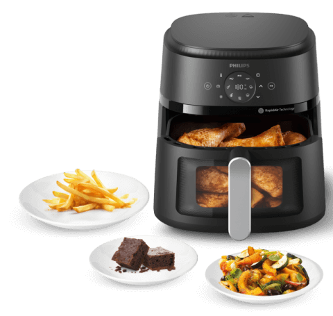 Philips Ovi otoczony talerzami z potrawami