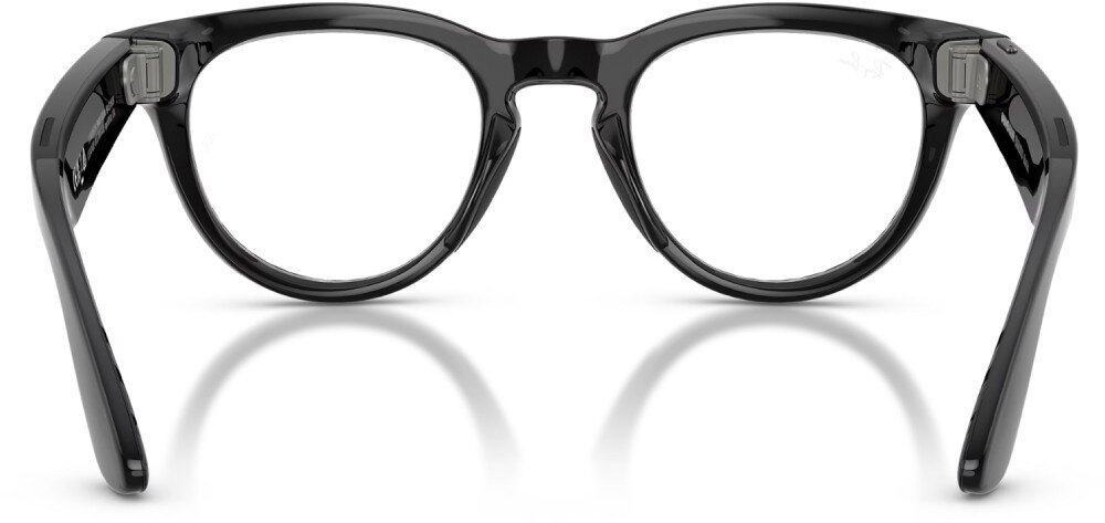 Okulary META Ray-Ban Headliner Gen 2 Czarne okulary w zaokrąglonych oprawkach widziane od strony zauszników umieszczone na białym tle, na dole widać cień