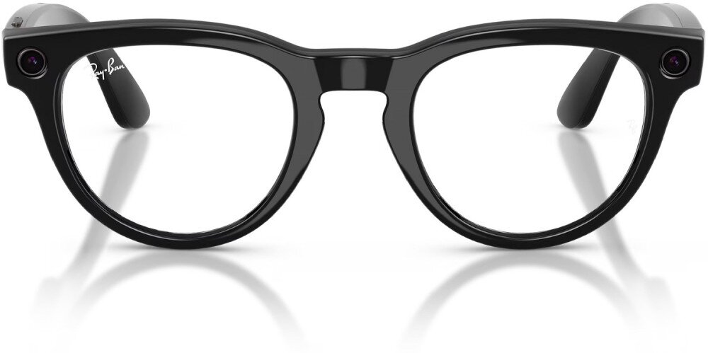 Czarne, błyszczące okulary z okrągłymi soczewkami i logo \'Ray-Ban\' na zauszniku. Na końcach zauszników widoczne są małe kamery.