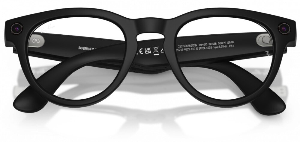 Okulary META Ray-Ban Headliner Gen 2 Czarne okulary w zaokrąglonych oprawkach leżące na czarnych zausznikach, na zausznikach widać białe napisy