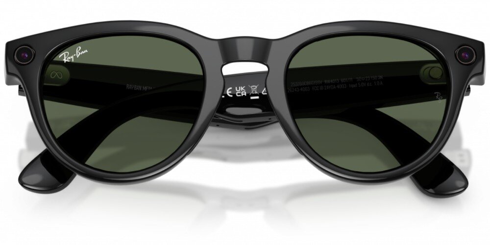 Okulary META Ray-Ban Headliner Gen 2 Czarne okulary w zaokrąglonych oprawkach leżące na czarnych zausznikach, na zausznikach widać białe napisy