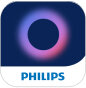 Logo przedstawia okrągły kształt z gradientem kolorów od fioletowego do różowego na ciemnoniebieskim tle. Pod spodem znajduje się napis \'PHILIPS\'.