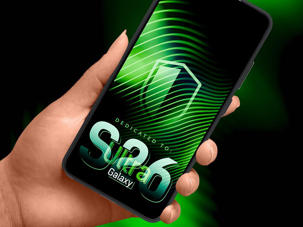 Etui XLINE Satin Guardx MagSafe do Samsung Galaxy S26 Ultra Dłoń trzymająca telefon Samsung Galaxy S26 w czarnym etui ochronnym marki 3nk. Na ekranie widoczna neonowa zielona grafika z napisem „Dedicated to S26 Galaxy”, prezentująca dopasowanie akcesorium do modelu.