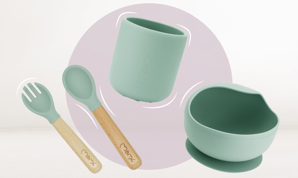 Zestaw naczyń MOMI Ami Zielony Nauka samodzielnego jedzenia Zaokrąglone, ergonomiczne kształty wysokie krawędzie naczyń Sztućce dopasowane do małych dłoni rozwój koordynacji ruchowej