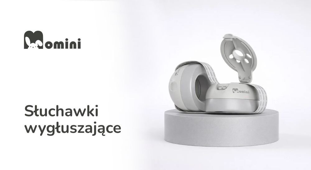 Słuchawki wygłuszające MOMINI Mimi ochrona słuchu dzieci redukcja hałasu komfort użytkowania, słuchawki leżące na postumencie na białym tle