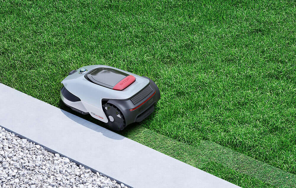 Robot koszący DREAME A2 2000 ogród trawnik robot kosi trawę wzdłuż chodnika dwa inteligentne tryby pracy przy krawędziach tryb koszenia wewnątrz granicy urządzenie dokładnie podąża wzdłuż tej linii tryb koszenia przy granicy jazda dokładnie wzdłuż styku trawnika z obszarem bez trawy