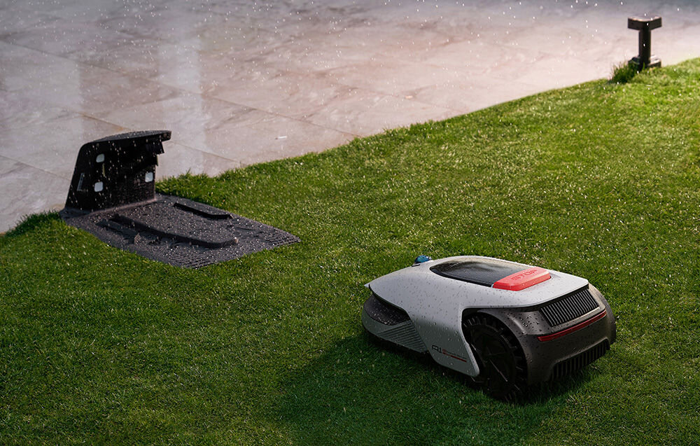 Robot koszący DREAME A1 PRO 1000 ogród trawnik robot kosi trawę krople deszczu robot wraca do stacji ładowania wbudowany czujnik deszczu urządzenie automatycznie wraca do stacji ładującej w czasie opadów i wznawia przerwane koszenie naładowanie akumulatora spadnie poniżej 15% czas ładowania do 100% wynosi około 65 minut wbudowany akumulatorem o pojemności 4 Ah czas pracy około 45-60 minut