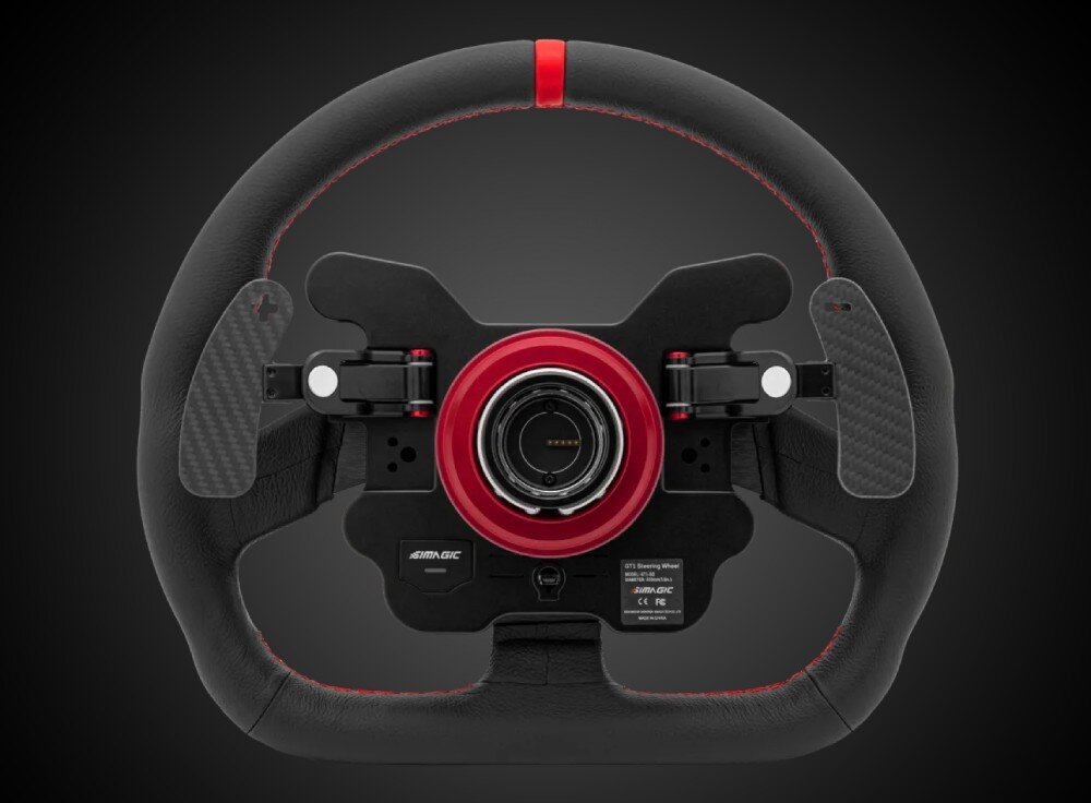 Kierownica SIMAGIC GT1-SD Tył kierownicy wyścigowej z odsłoniętym mechanizmem szybkiego odpinania, czterema łopatkami i etykietą informacyjną