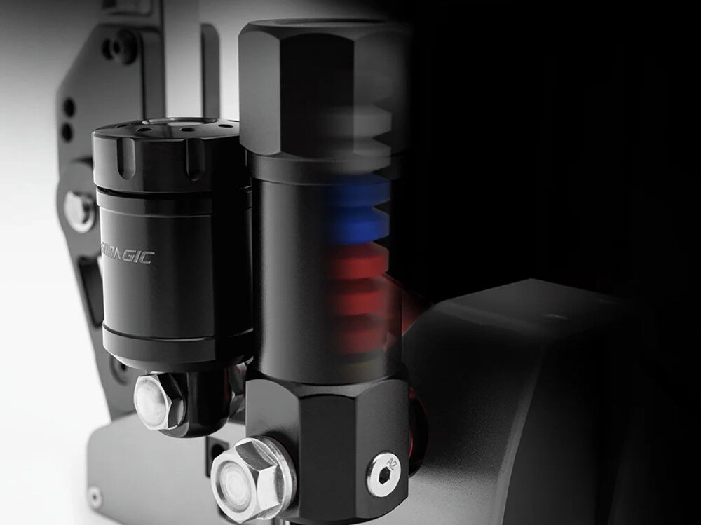 Hydrauliczny hamulec ręczny SIMAGIC TB-RS S504 Widok na mechanizm sprężynowy hamulca z boku, obok zbiornika z logo, odsłonięty cylinder ze sprężynami, na podstawie śruby