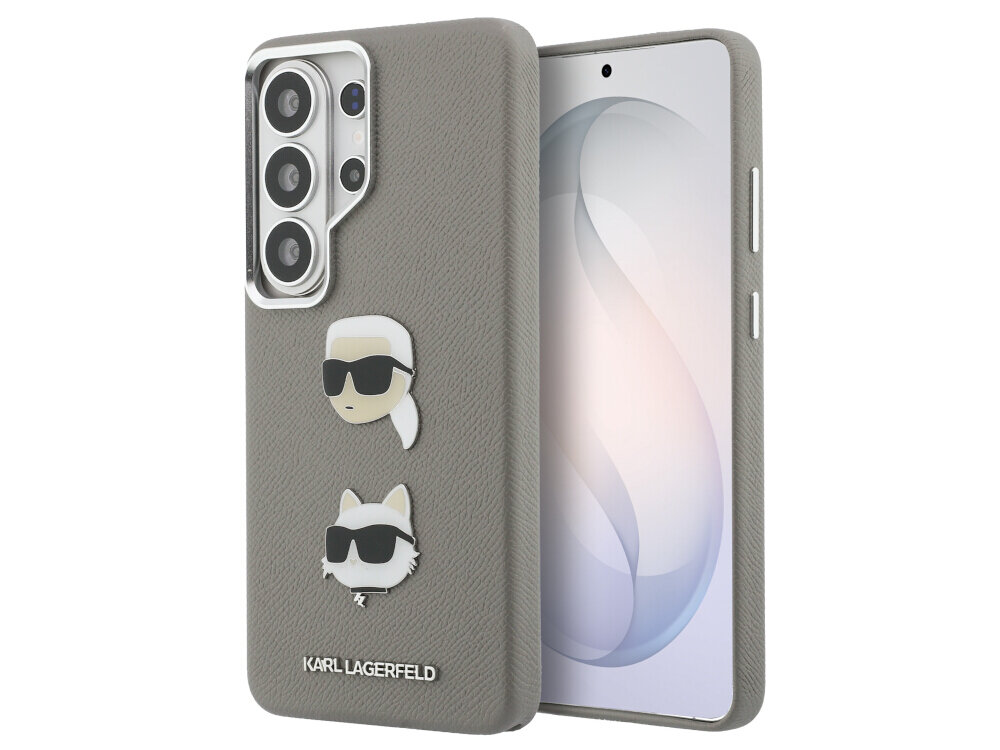 Etui na telefon w kolorze srebrnym z dwoma metalowymi emblematami przedstawiającymi postacie w okularach przeciwsłonecznych. Na dole etui widnieje napis \'KARL LAGERFELD\'.