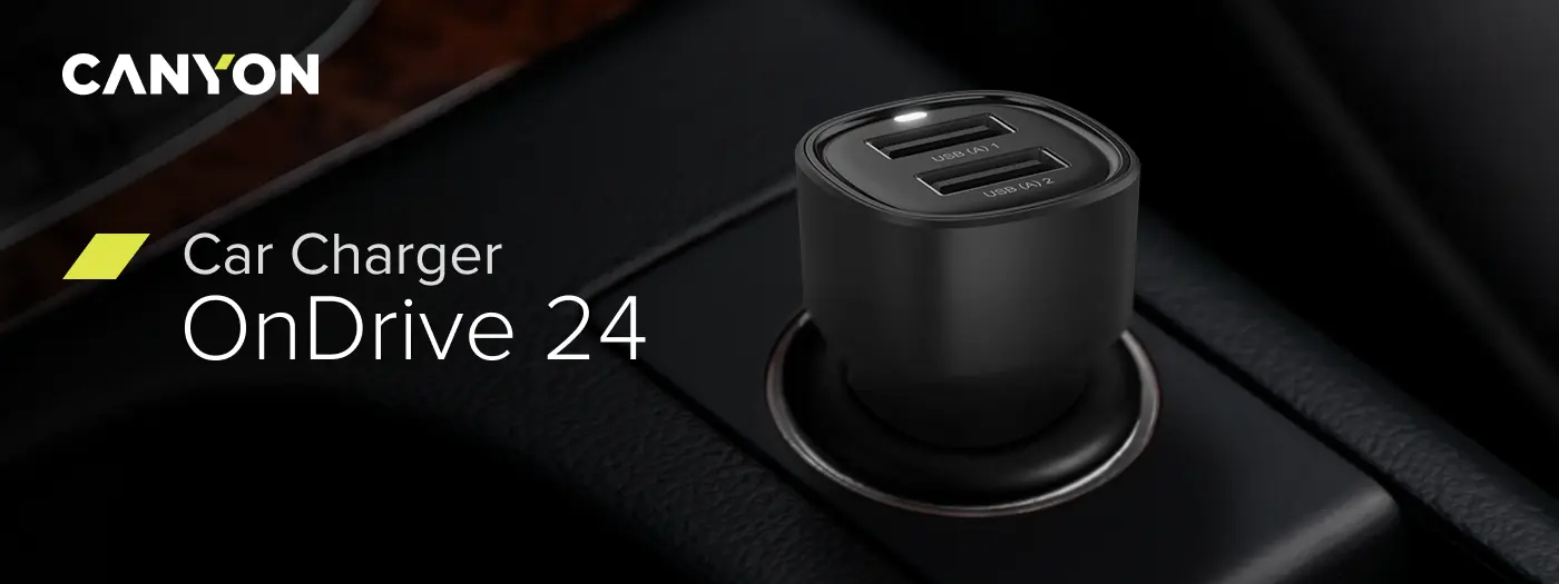 Czarna ładowarka samochodowa z dwoma portami USB-A umieszczona w gnieździe samochodowym. Widoczny tekst: \'CANYON Car Charger OnDrive 24\'.