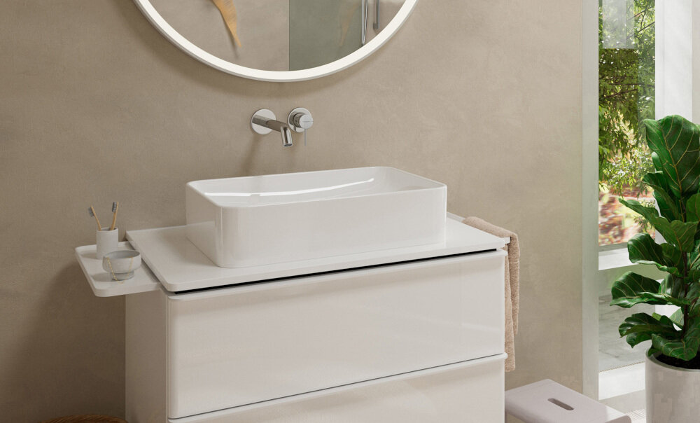 BATERIA UMYWALKOWA PODTYNKOWA HANSGROHE TECTURIS Bateria podtynkowa hansgrohe nad umywalką nablatową w jasnej łazience. Chromowane wykończenie harmonijnie komponuje się z ceramiką ceramiczna głowica zasięg wylewki 165 mm metalowy odpływ trwała konstrukcja