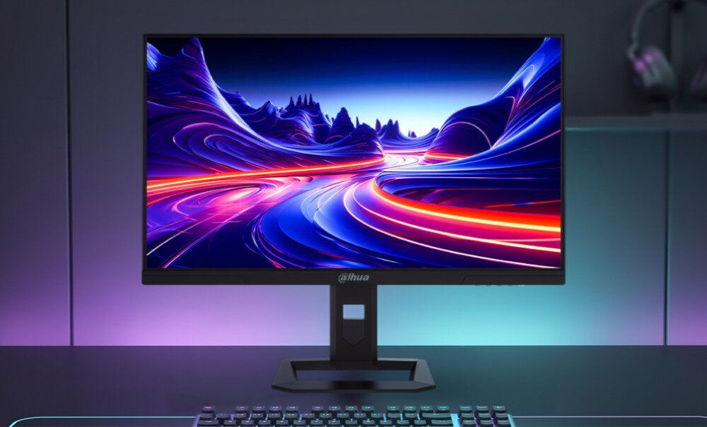 Monitor z wyświetlaczem pokazującym kolorową, abstrakcyjną grafikę z dynamicznymi liniami. Na ramce monitora widoczne jest logo \'Dahua\'.