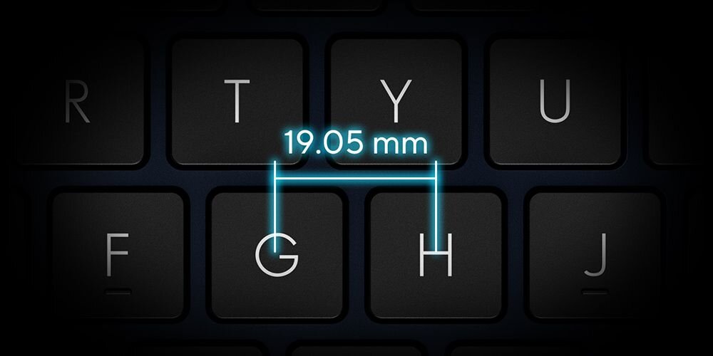 Pełnowymiarowa klawiatura ASUS VivoBook 16 prezentuje odstęp klawiszy 19,05 mm na ciemnym tle – Pełnowymiarowa klawiatura