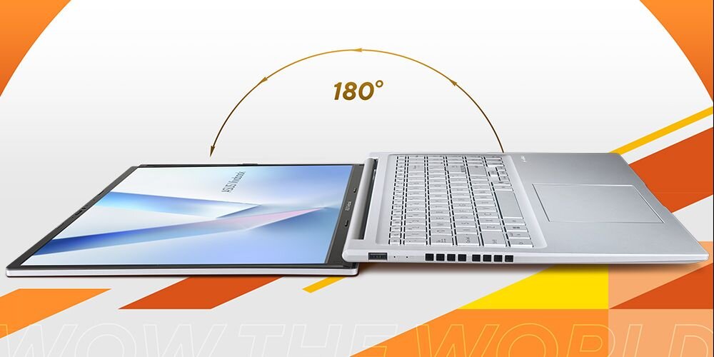 Laptop ASUS VivoBook 16 rozłożony na płasko w kącie 180 stopni na dynamicznym pomarańczowo‑białym tle – Szeroko otwarta pokrywa