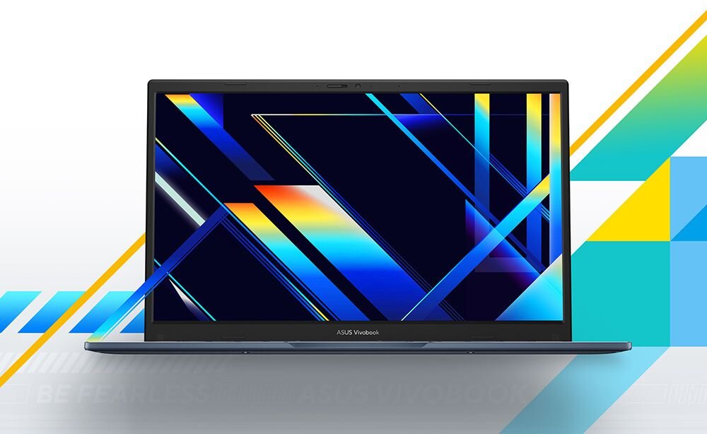 Laptop z wyświetlaczem pokazującym kolorowe, geometryczne wzory. Na dolnej ramce ekranu widoczny jest napis \'ASUS Vivobook\'.
