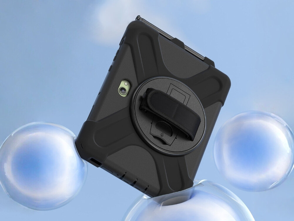Czarne etui ochronne z uchwytem na tablet, unoszące się w powietrzu na tle nieba z widocznymi bąbelkami. Etui ma solidną konstrukcję z wyraźnymi wzmocnieniami i okrągłym uchwytem na rękę.