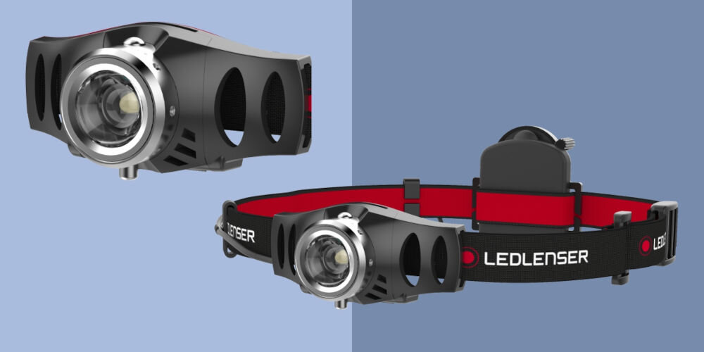 Latarka LEDLENSER H3.2 niebieskie tło czarna latarka czerwone elementy solidny model wszechstronne zastosowanie nocne treningi biegowe relaksujące wieczory z książką w namiocie strumień światła o mocy 120 lumenów zasięg do 100 m w terenie w codziennych sytuacjach wymagających wydajnego oświetlenia dla aktywnych osób podróżników komfort bezpieczeństwo po zmroku
